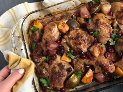 Baking dish with cooked chicken and vegetables