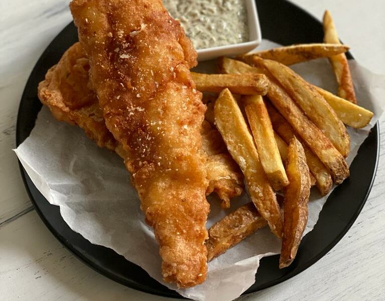 Traditional Homemade British Beer Battered Fish and Chips, with a classic  easy batter recipe