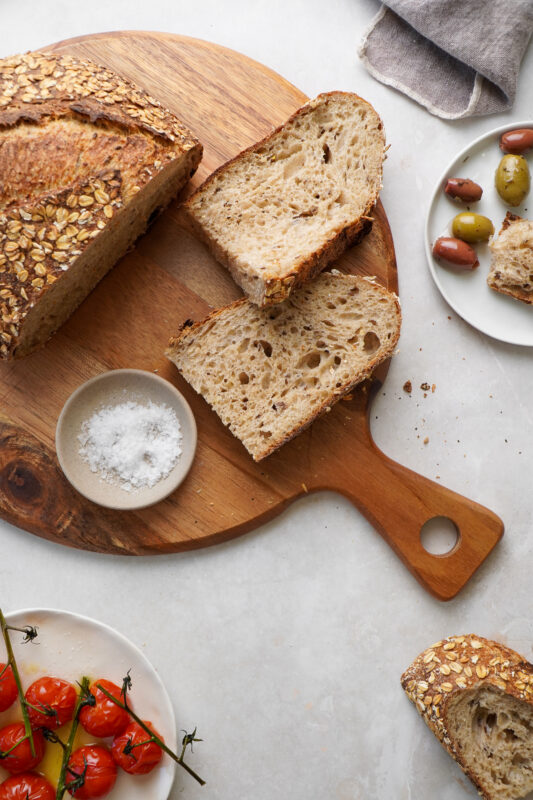 A sliced loaf of sourdough whole grain spelt bread 